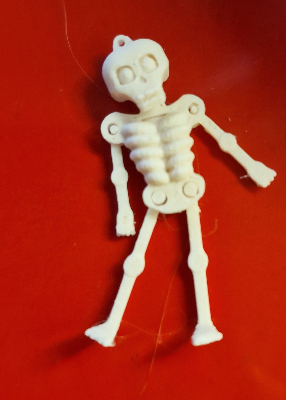 Skeleton earring articulated